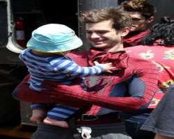 He also loves kids, that is shown from an instance when a woman with a baby met him on a set. He with no delay picked the baby and started playing wit